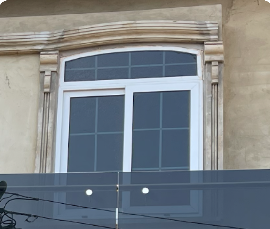 White Frame Tinted Sliding Window